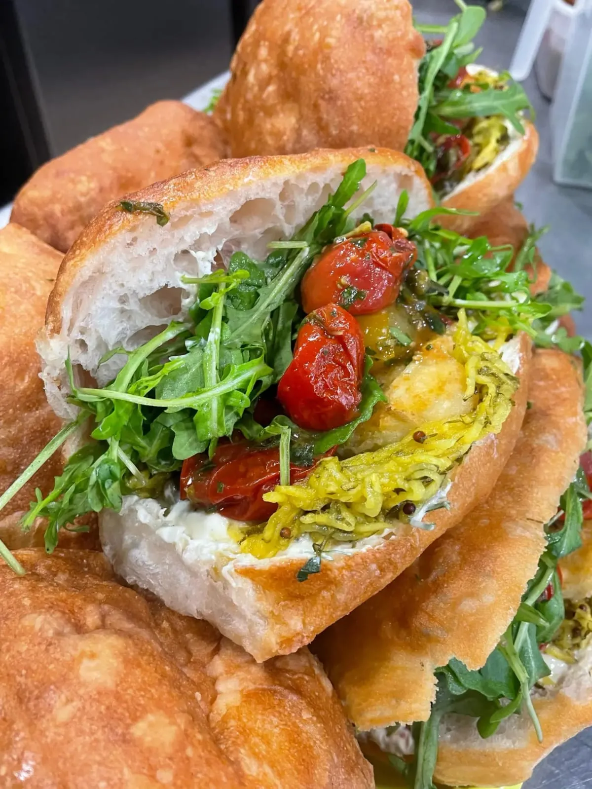 Focaccia filled with rocket, roast tomatoes and hash brown at The Pickle Kemptown