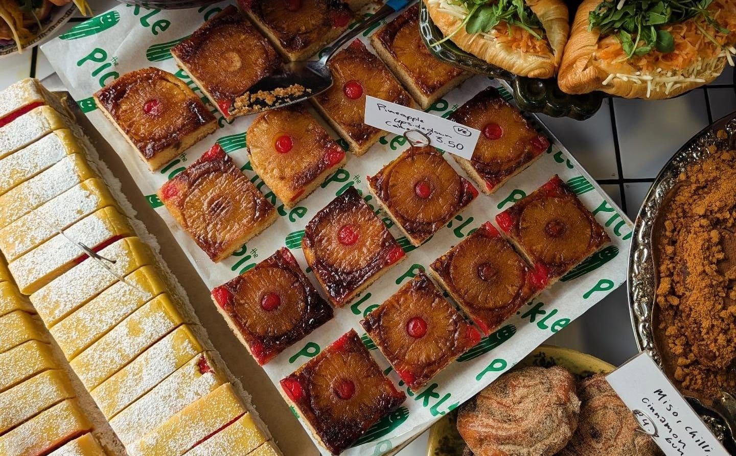 Morning bake display of rolls, traybakes and pastries at The Pickle Kemptown