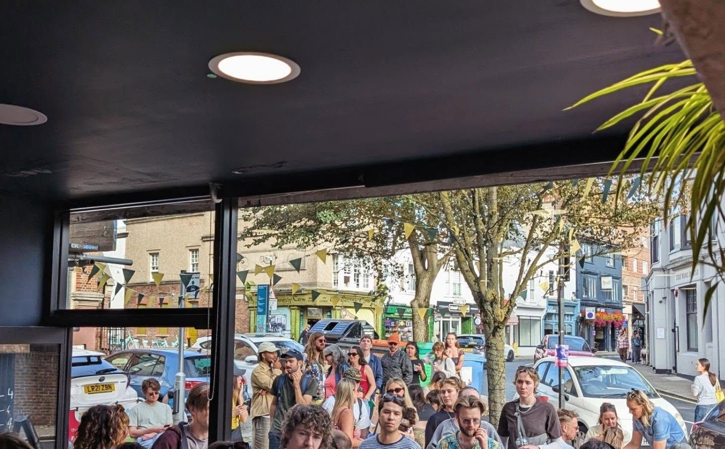 Busy hash brown party inside and outside The Pickle, Kemptown, Brighton