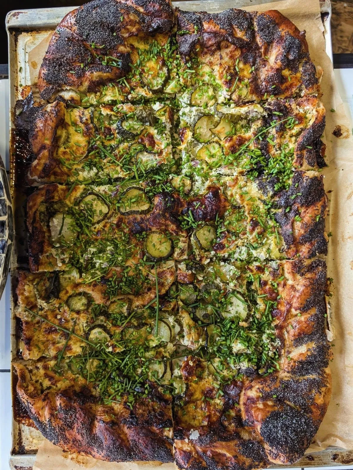Homemade pickle pie with mozzarella and hot honey at The Pickle Brighton