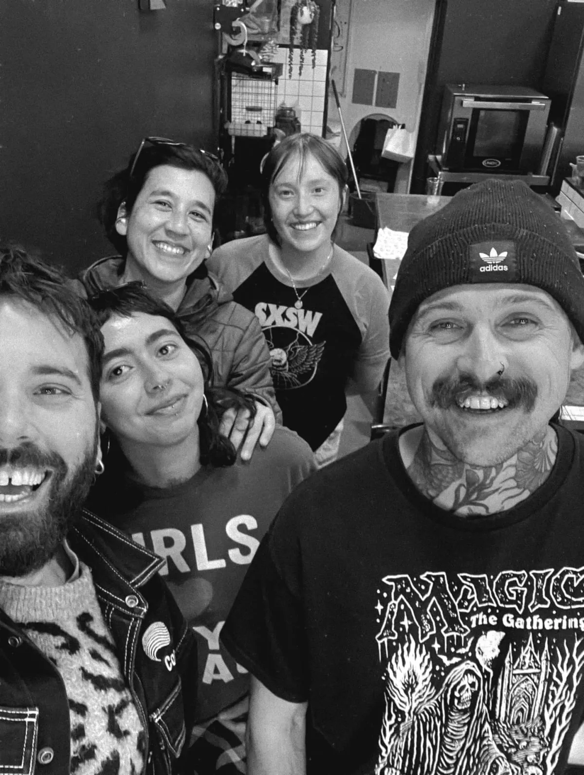 The Pickle team smiling together in the shop, Kemptown Brighton